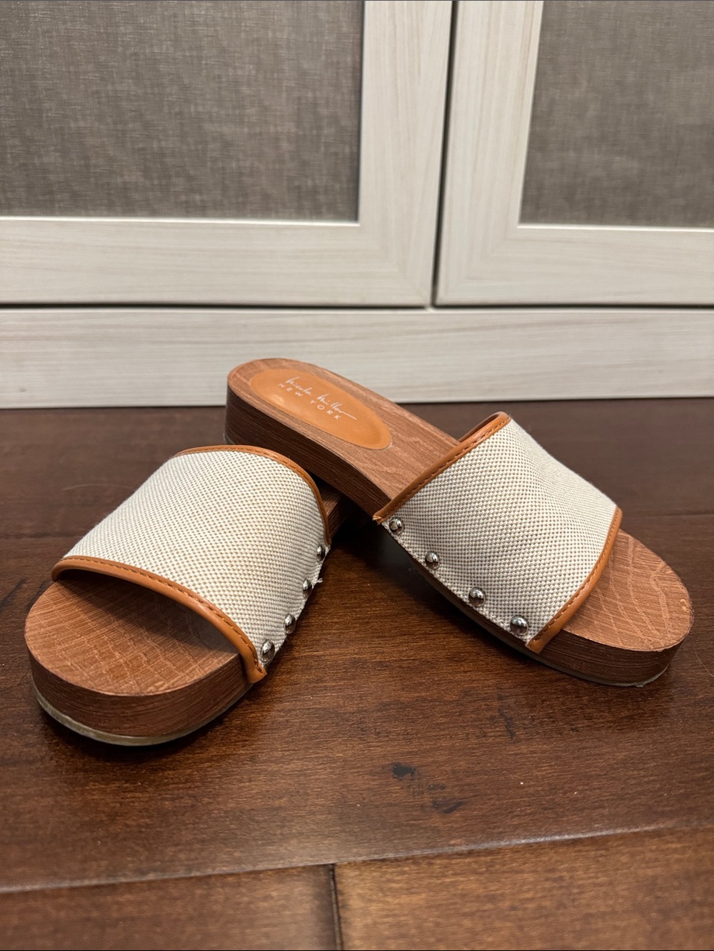 Nicole Miller Cream Canvas Slide Mules with Tan Trim and Studs